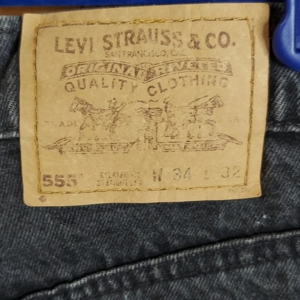 90's Levi's Strauss 555 relaxed fit straight leg.